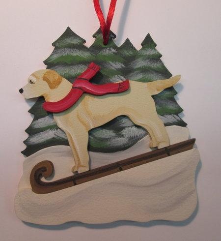 Tobogganing Dandy Dog with festive red scarf